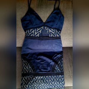 NBD Navy and Gold Dress. Cut Out Detail.